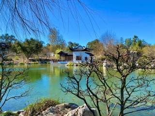 A House On A Hill By A Lake