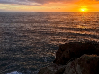 A Sunset Over The Ocean
